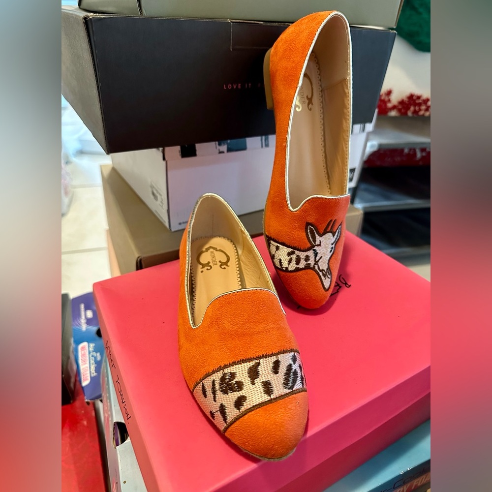 C. Wonder Flats, fun embroidery, gold-tone trim. Cushioned footbed for comfort.
